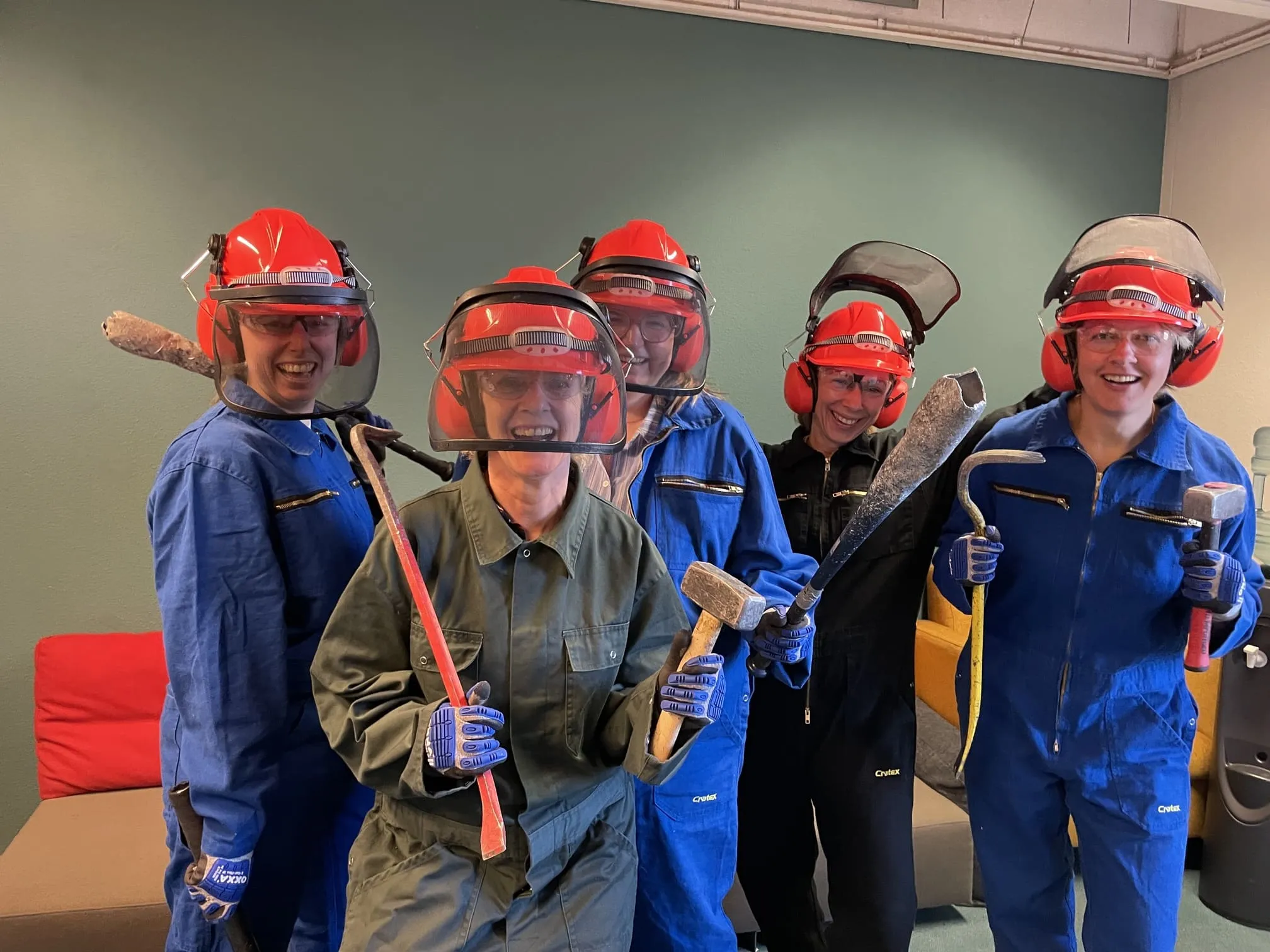 Colleagues mid-session in a group activity at The Rage Room